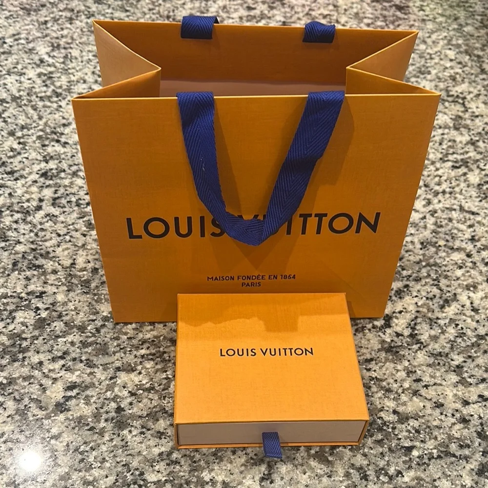 Louis Vuitton Orange & Cream Garment/Storage Bag Set
